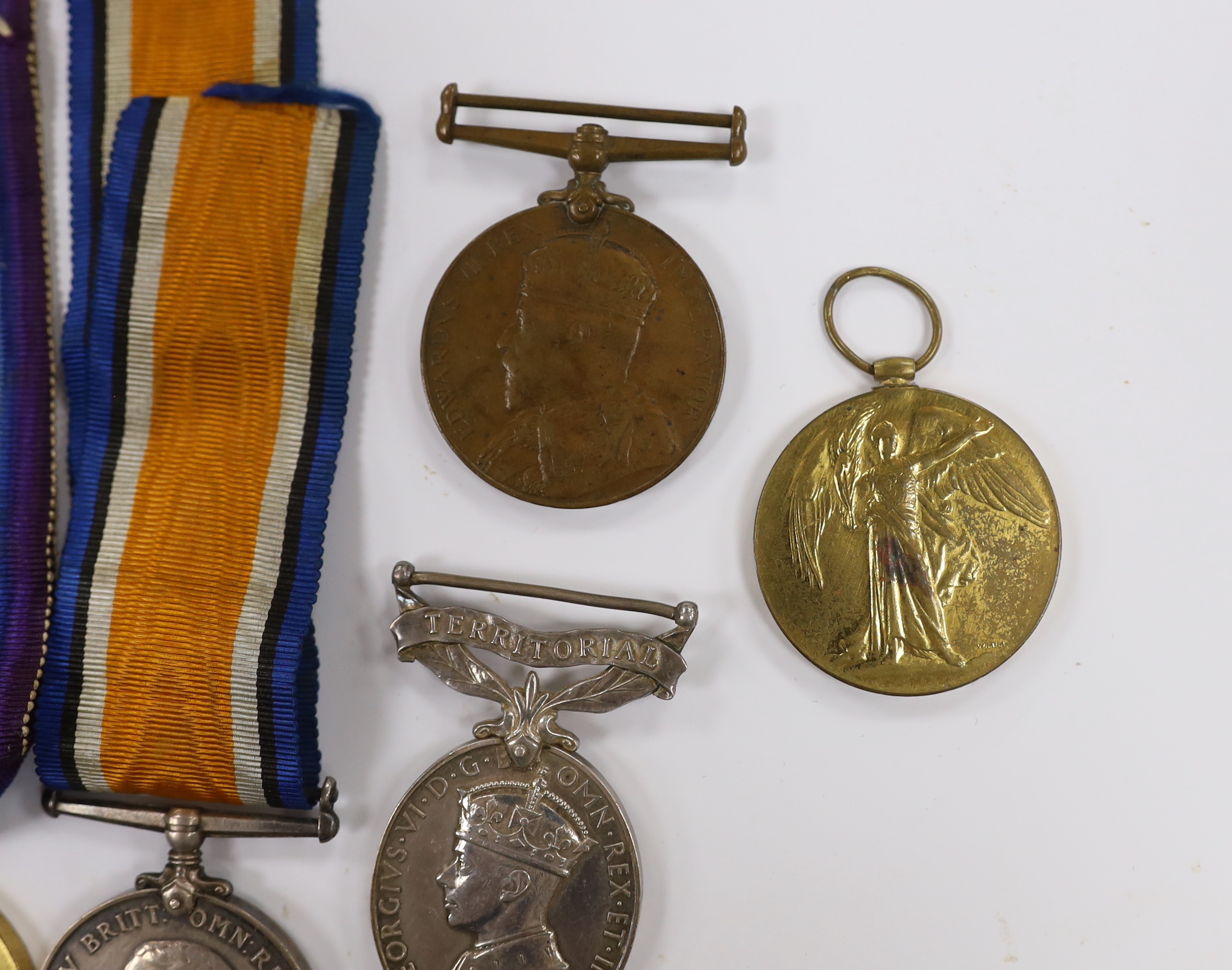 Ten medals; two First World War pairs of the Victory medal and the British War medal to Pte. F.J. Pulham 24 London Reg. and Pte. H. Cannell M.G.C., three WWII medals; The Italy Star, The 1939-1945 Star and a 1939-1945 Wa